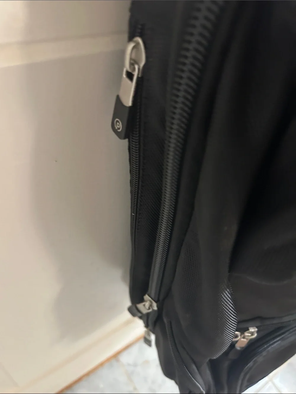 Portable Black Men's Backpack with Multi-Compartment Storage